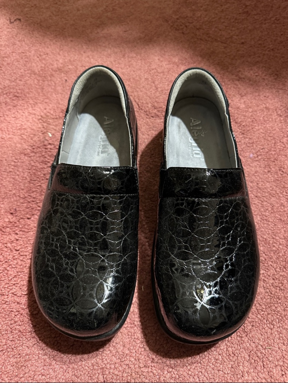 Alegria Black Patent Floral-Embossed Slip-On Mules